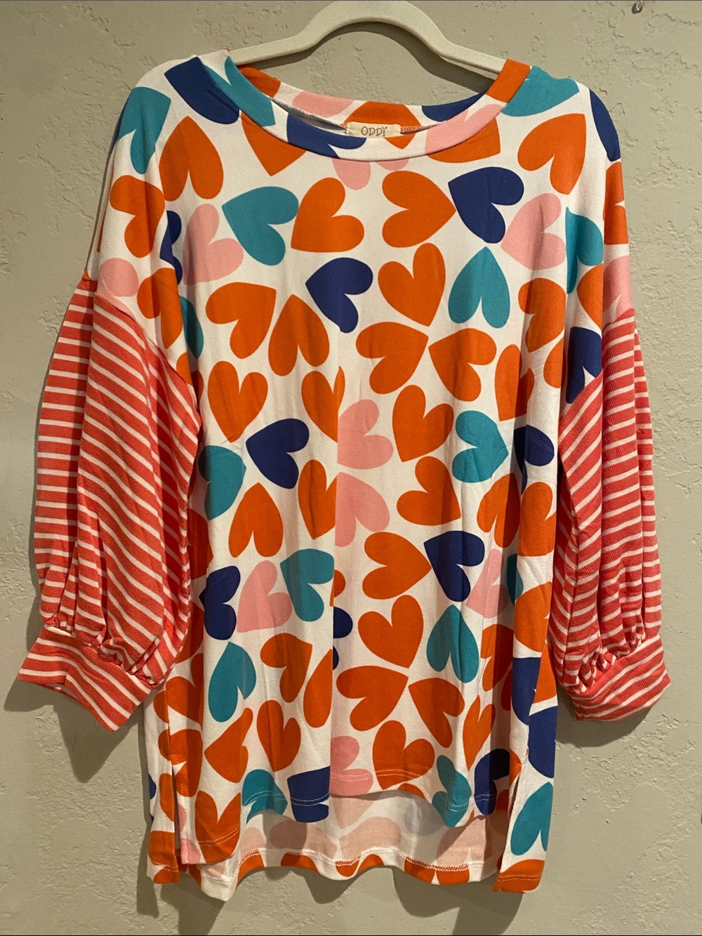 ODDY Floral and Stripe Whimsical Top. Size L PTP 23-29 Length 25 front 28 back.